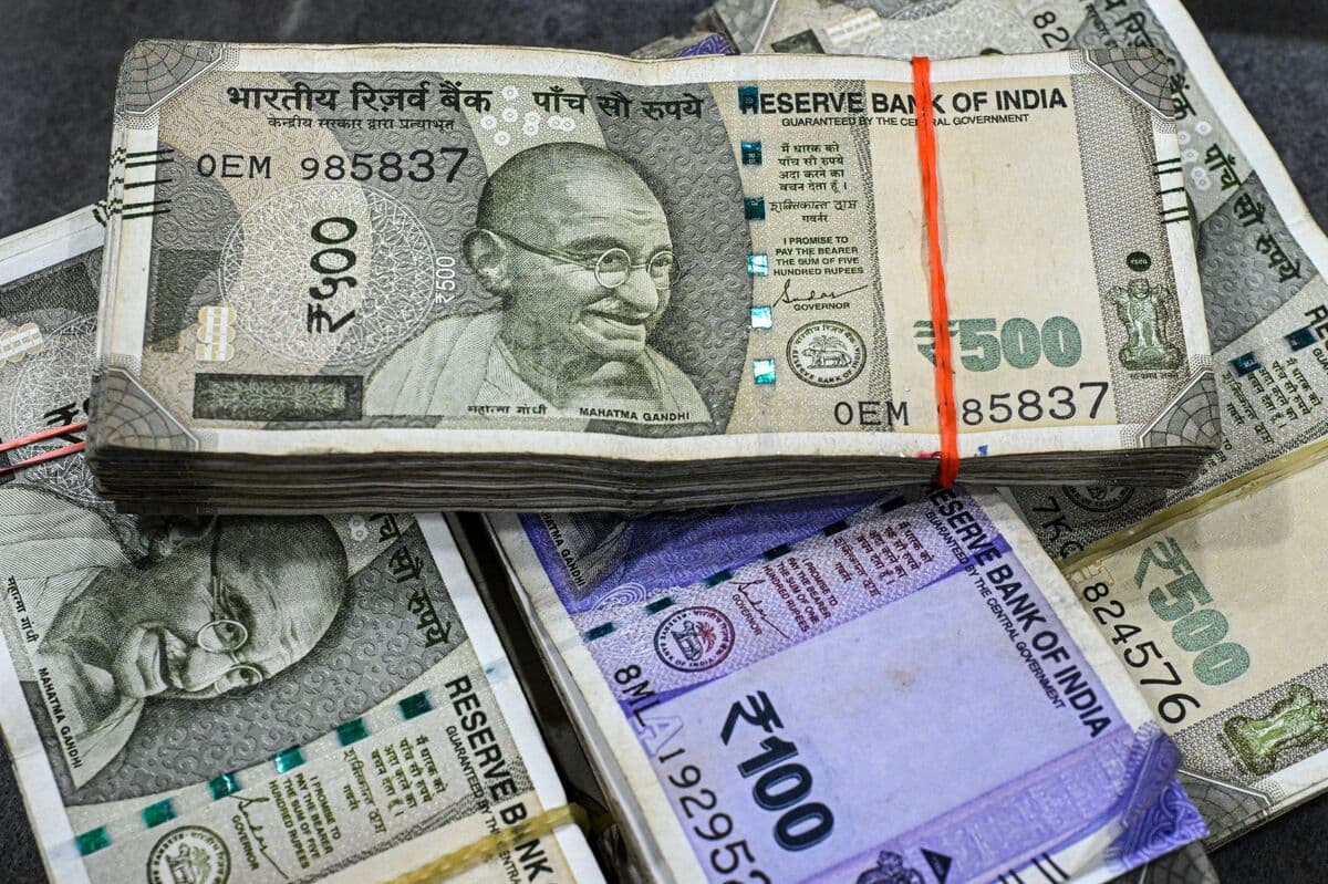 India Rupee Drops Past 93 to Dollar to Record Amid Crude Swings