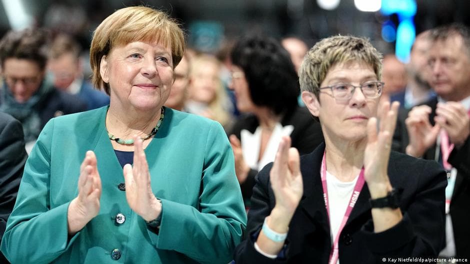 Merkel Calls for Patience with Merz's Coalition Amid Public Discontent