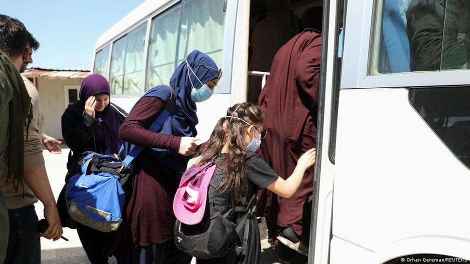 Australia says 13 IS-linked citizens to fly back from Syria