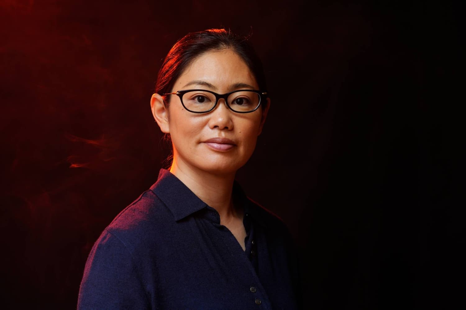 In sports photography, a Japanese woman finds her own angle