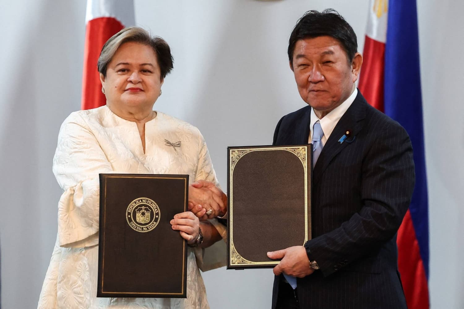 Japan and the Philippines sign new security pacts as regional tensions rise