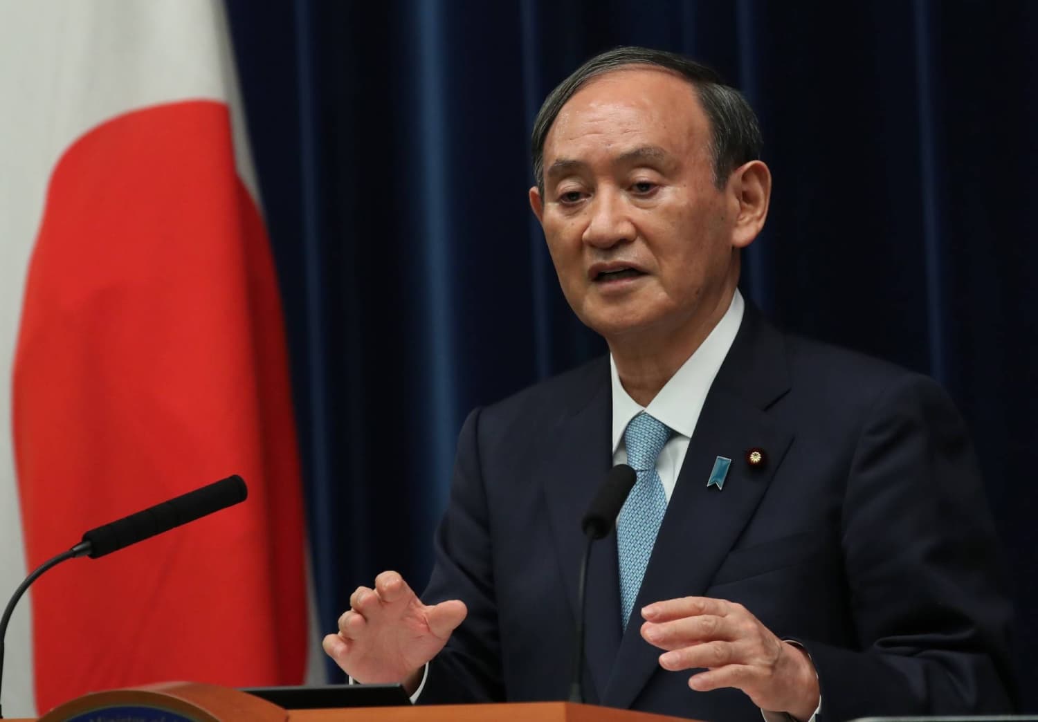 Suga won’t run in next election, reports say