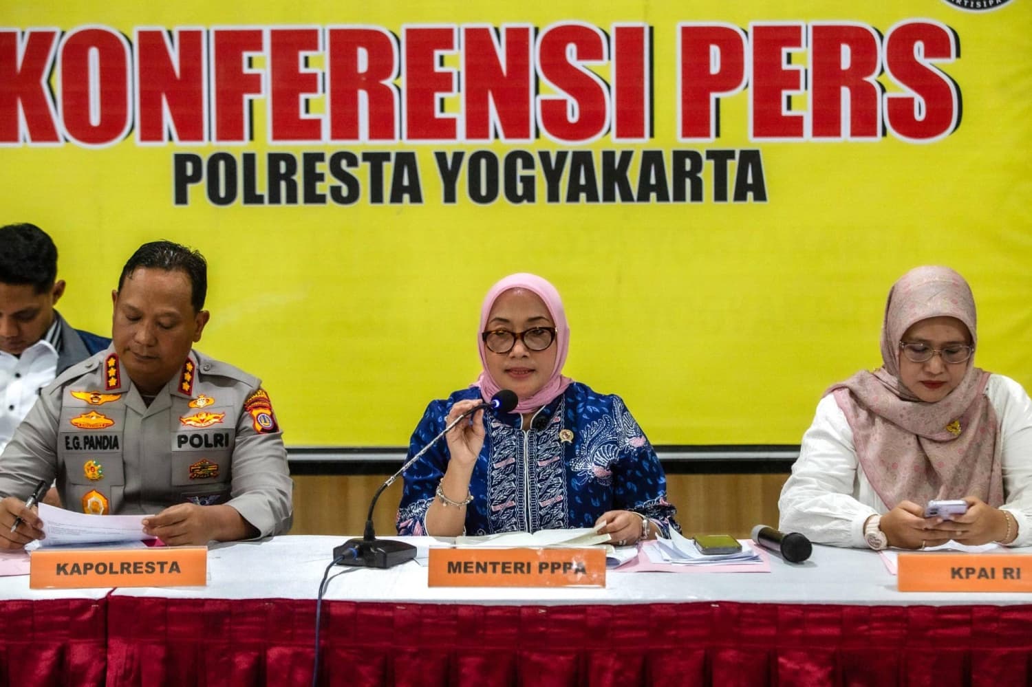 Indonesian police charge 13 in daycare abuse scandal