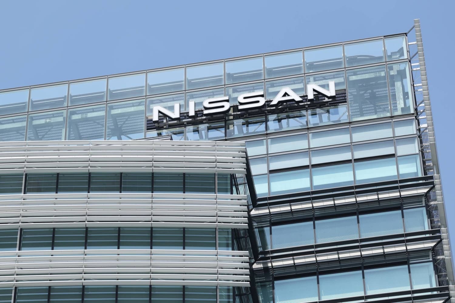 Nissan shares rise after carmaker revises forecast for profit instead of loss