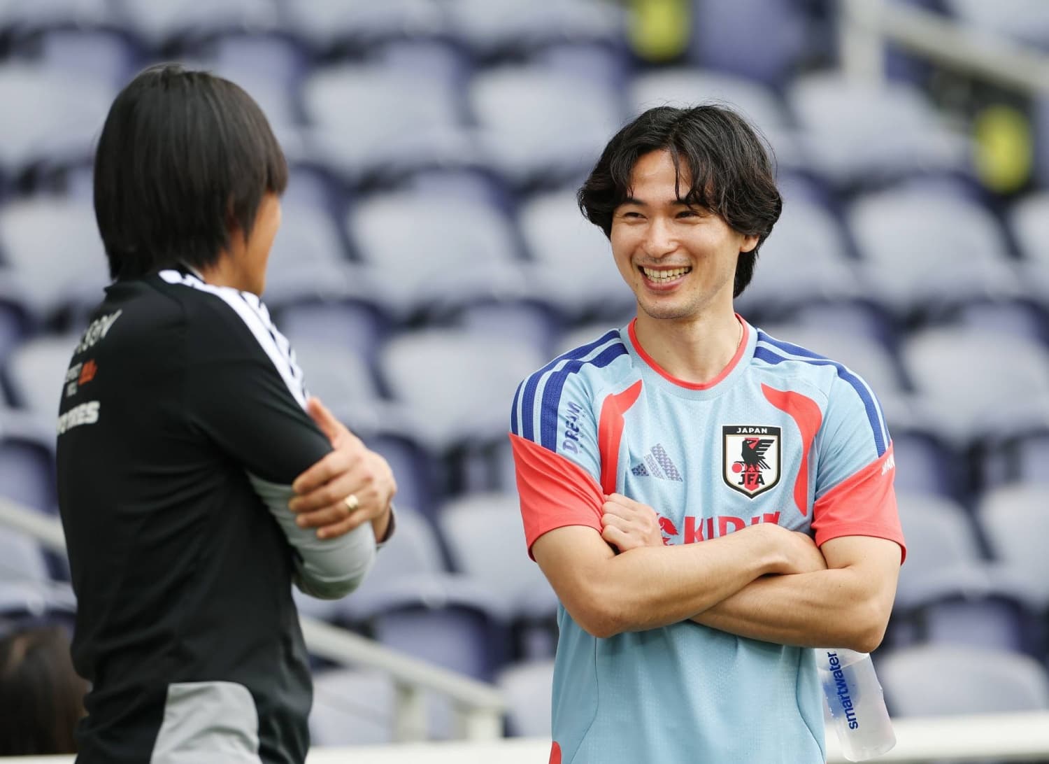 Injured Takumi Minamino Becomes Mentor for Japan at World Cup