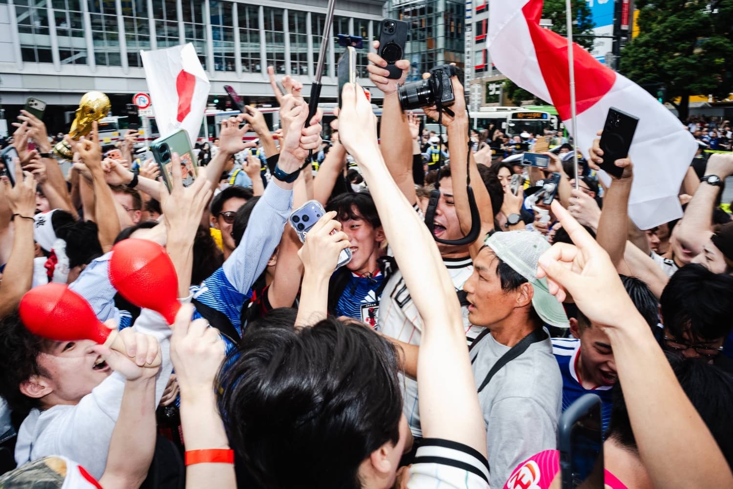 Fans Celebrate at Shibuya Crossing as Japan Advances to World Cup Knockout Stage