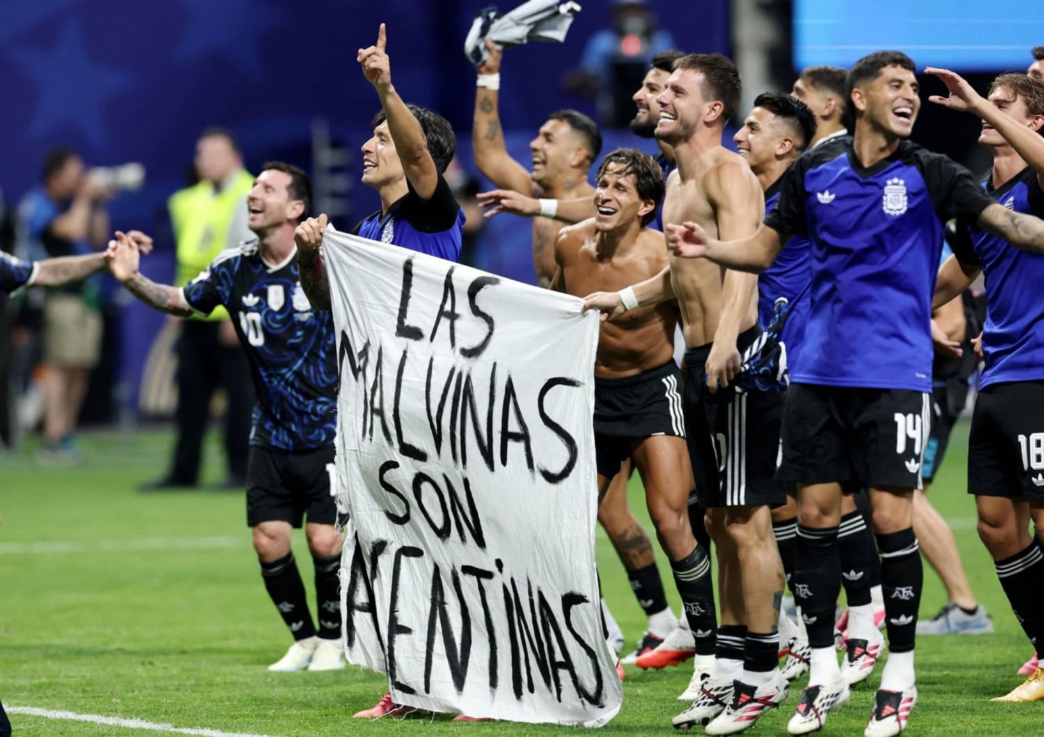 Argentine Players Display Falklands Flag Following World Cup Match Against England