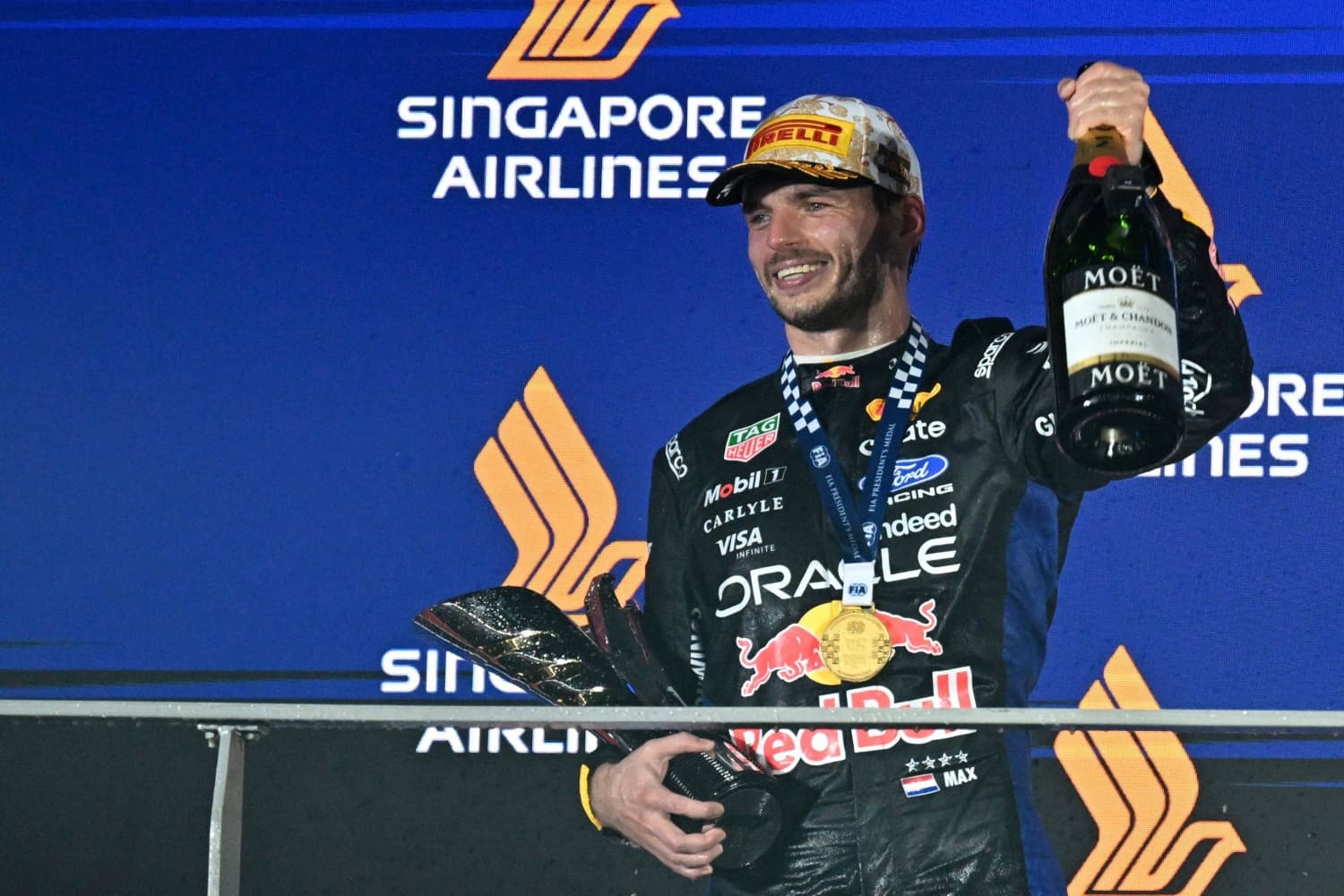 Verstappen Wins First Singapore Grand Prix After 10 Attempts