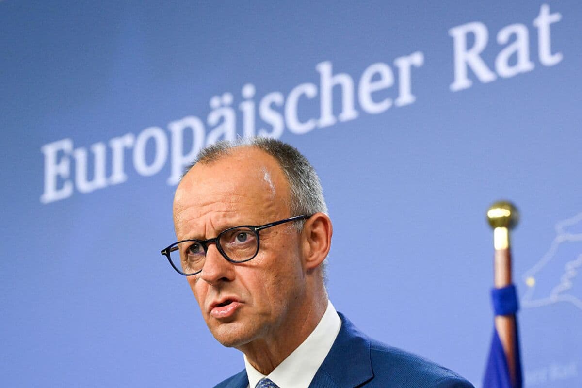 Germany's Merz Calls for Currency Discussions to Address Yuan Valuation