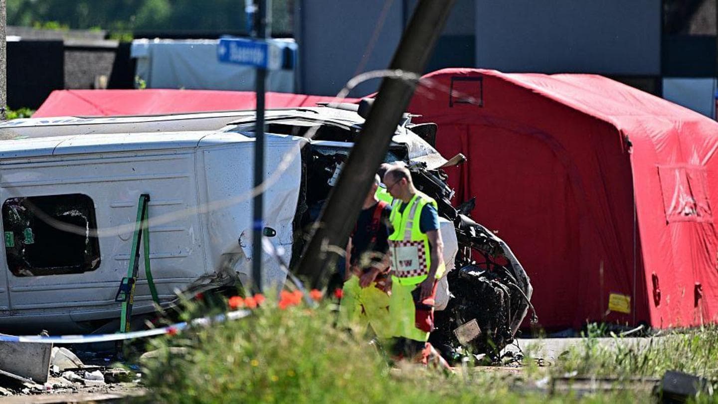 Four people, including two schoolchildren, die in Belgium minibus-train collision
