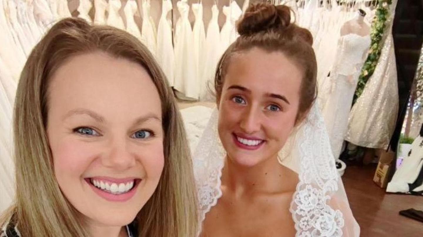 Seamstress Emily Green Crafts 40ft Wedding Train in Church Hall