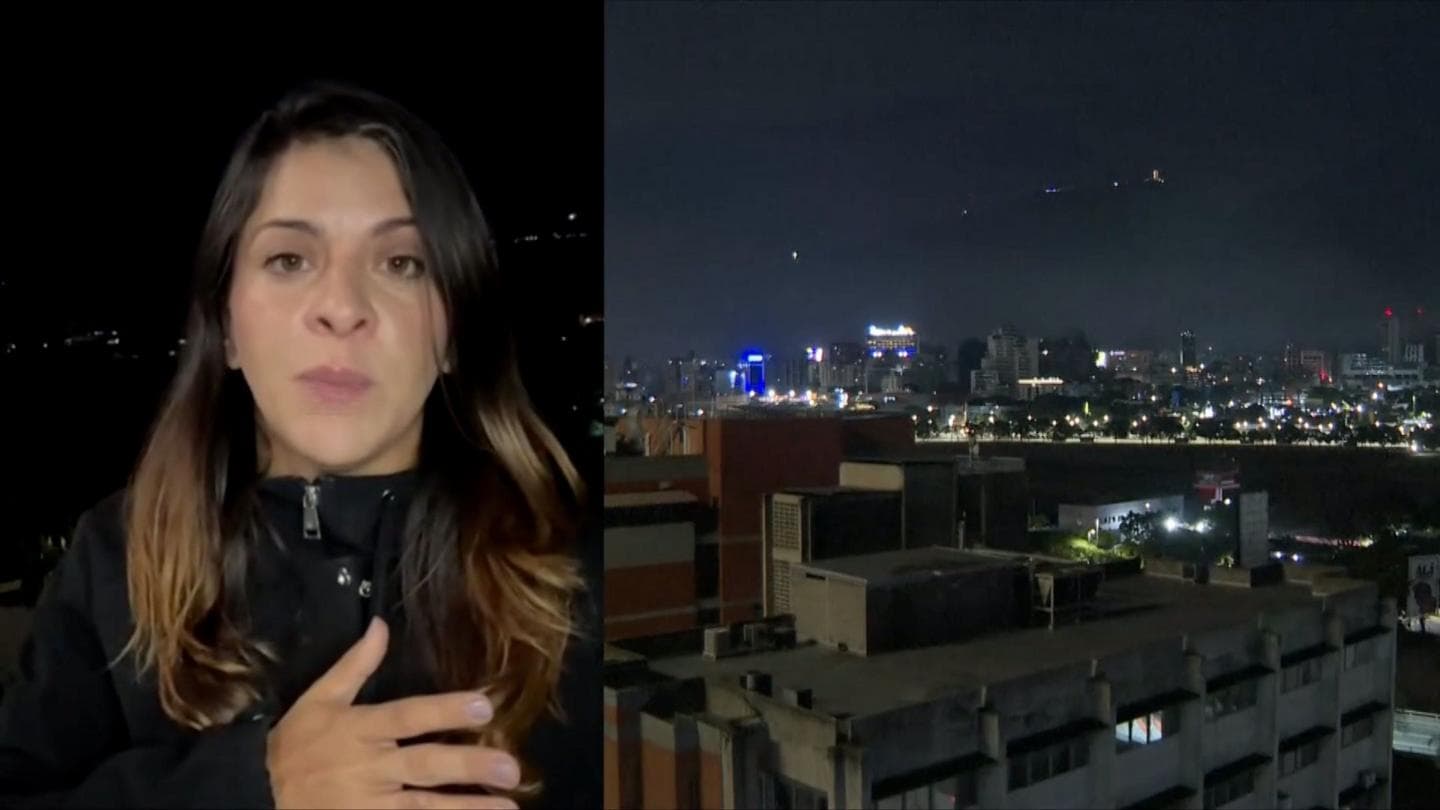 Reporter in Caracas describes hearing loud bangs and planes