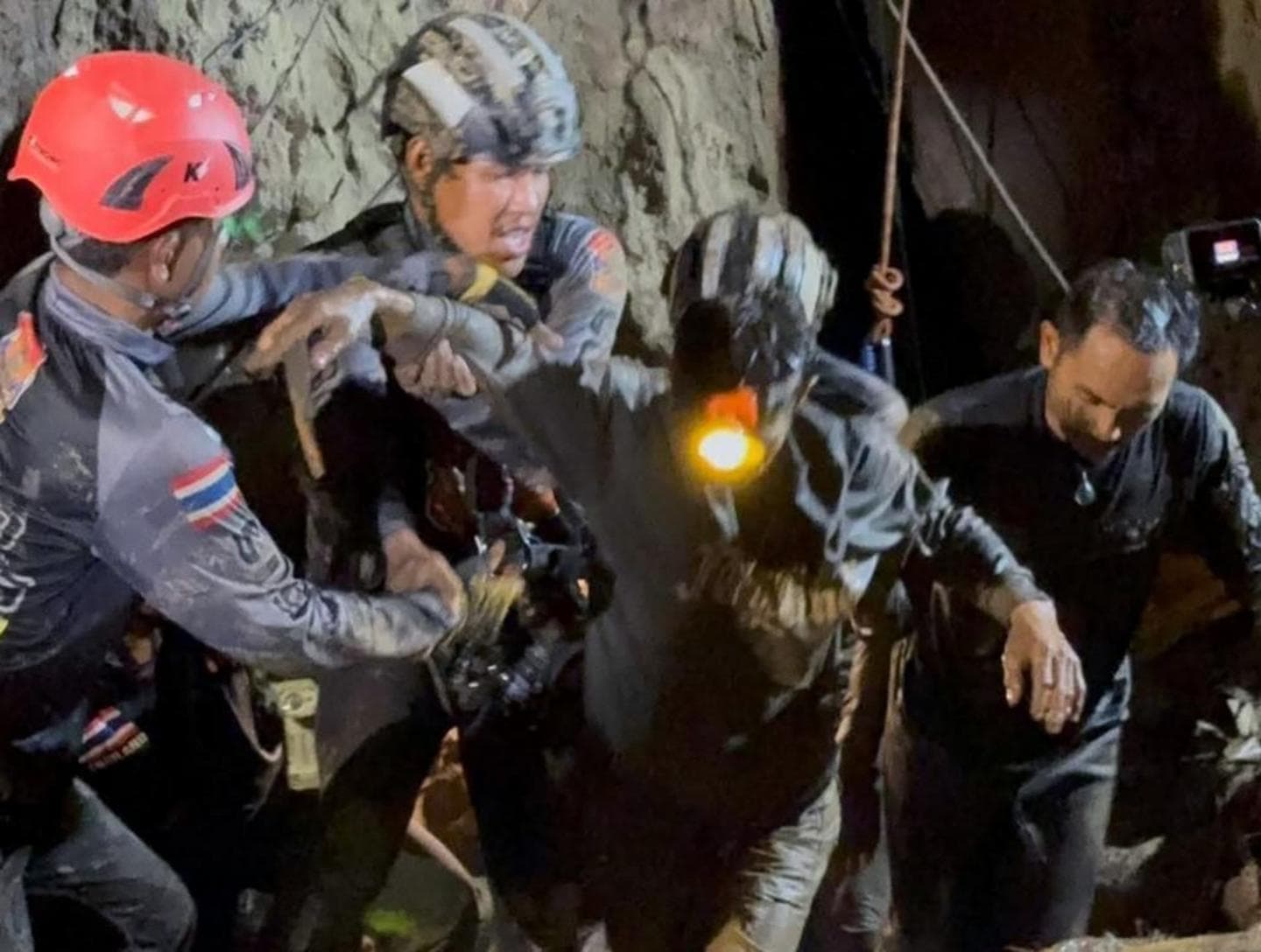First of five men rescued after nine days trapped in flooded Laos cave