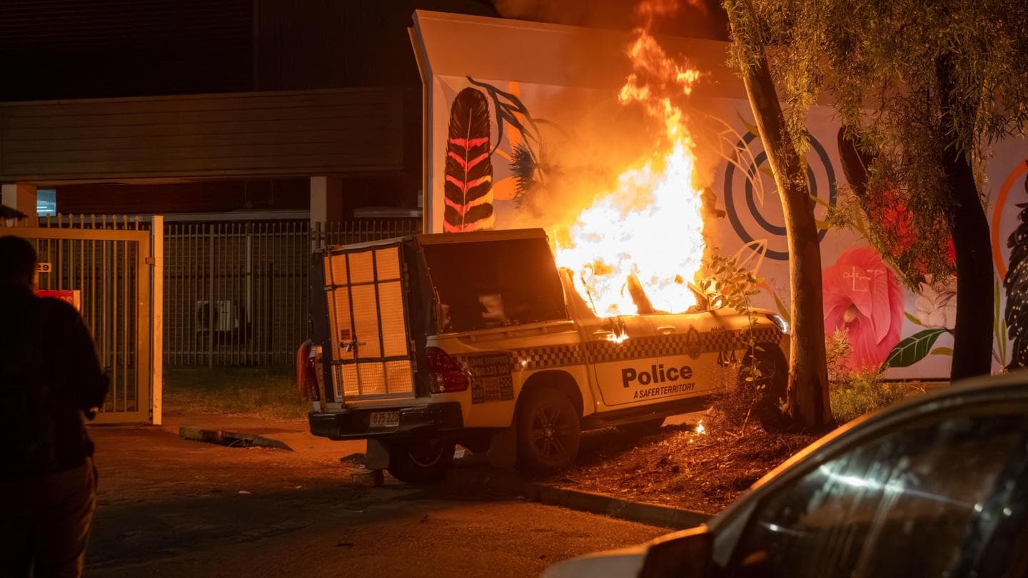 Violence in Australian town after arrest of man over girl's murder
