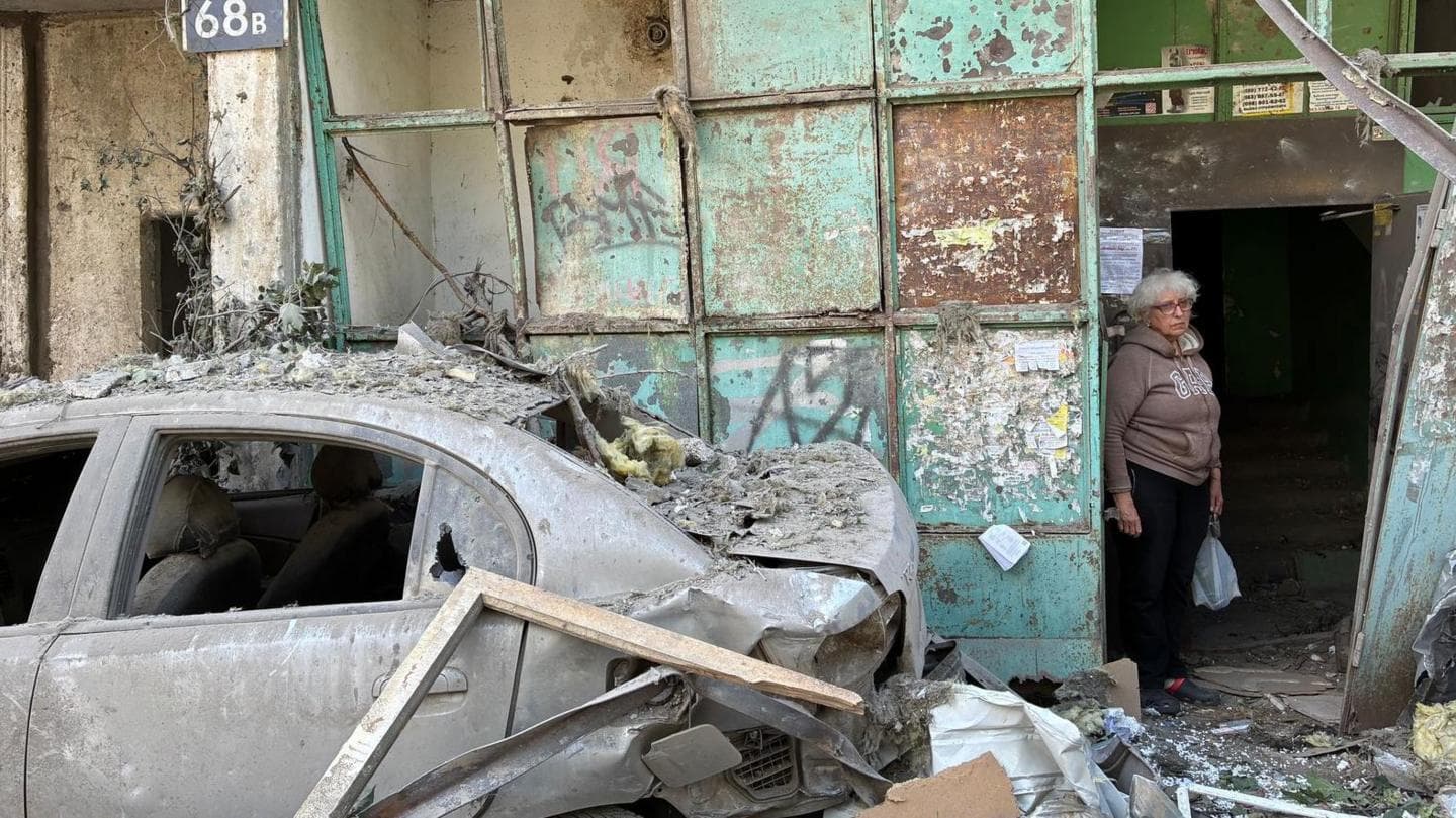 Ukrainians mourn as Russian attacks devastate neighborhoods, but life continues in Kyiv