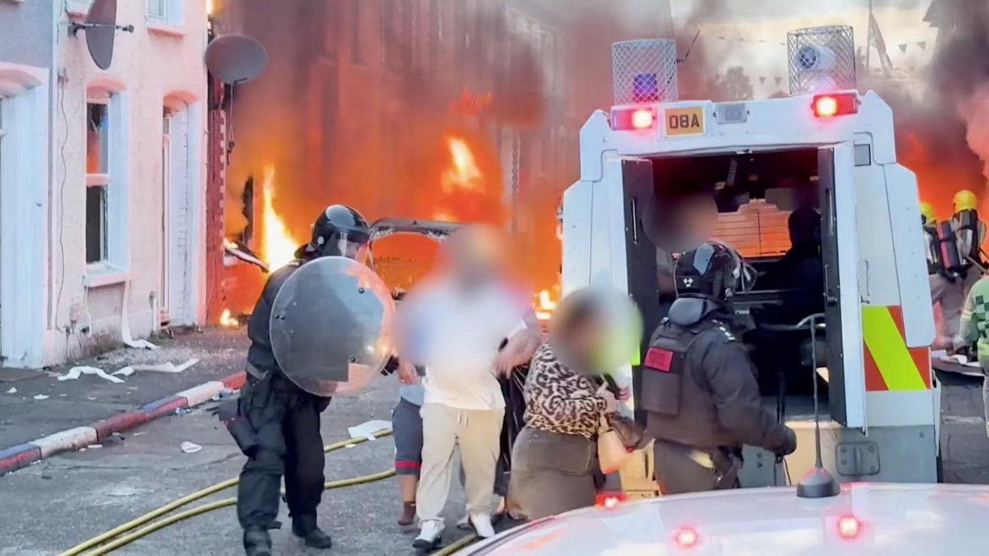Residents Evacuate as Fires Erupt in Belfast Following Knife Attack