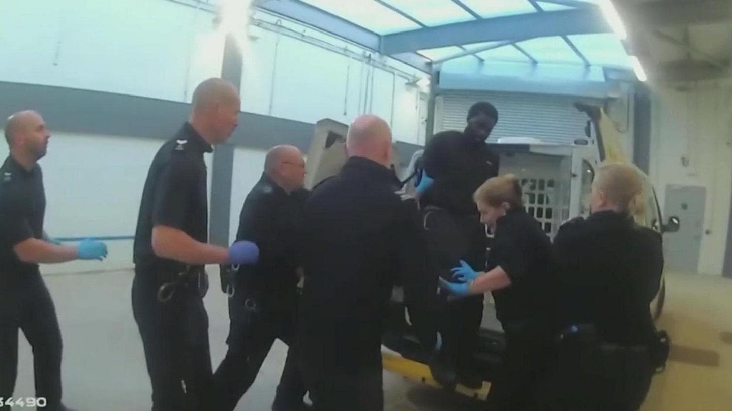 Killer kicked officer at station, inquiry shown