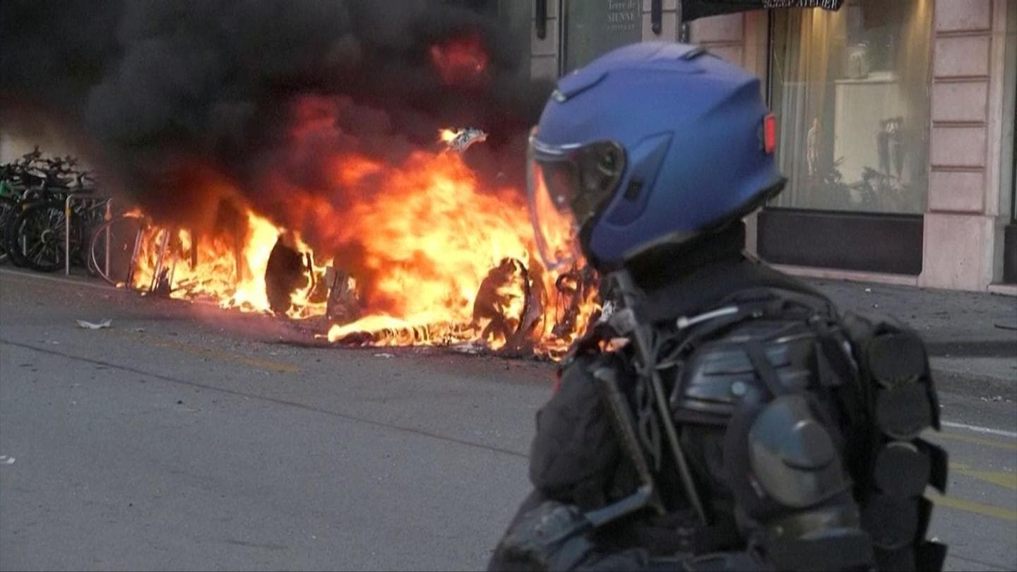 Protesters and police clash in Geneva ahead of G7 summit