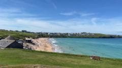 Two individuals found in the sea off Cornwall beach have died at the scene.