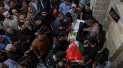Palestinians mourn the death of Gaza World Cup screenings organizer in Israeli airstrike