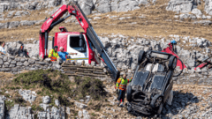 Driver hospitalized after car crashes off cliff following reckless driving