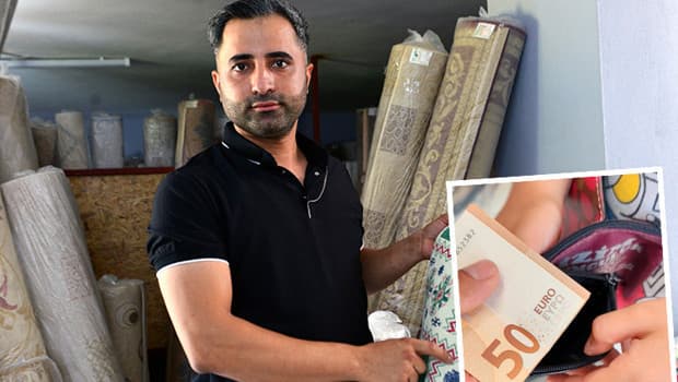 Halı yıkamacı, battaniyeden çıkan parayı sahibine teslim etti