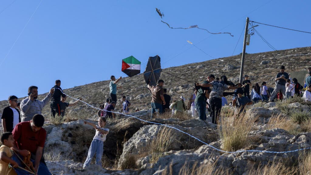 Palestinian Children Fly Kites in West Bank Village Amid Israeli Tensions