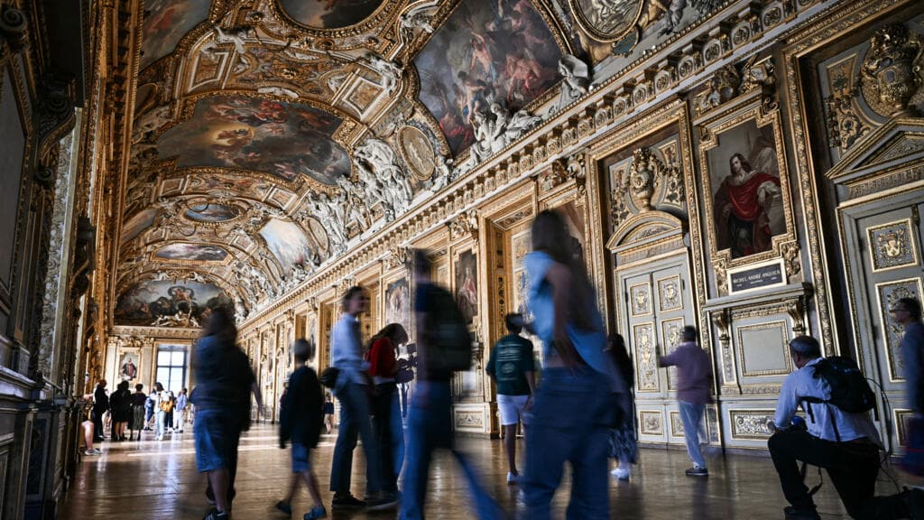 Two Germans Arrested After Sticking Paintings in Louvre's Mona Lisa Hall