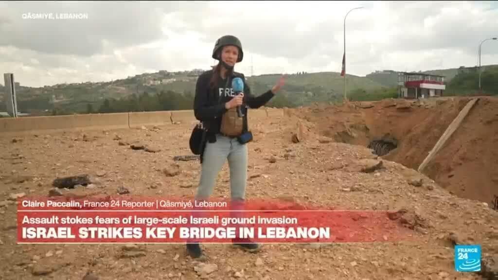 Israel strikes key bridge in south Lebanon, stoking fears of ground invasion