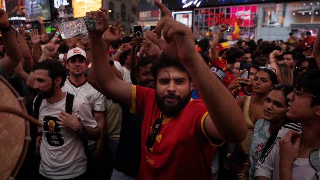 Spanish Fans Celebrate World Cup Victory Over Argentina