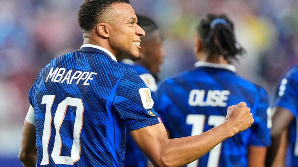 France Advances to World Cup Round of 32 with Victory Over Iraq Amid Weather Delay