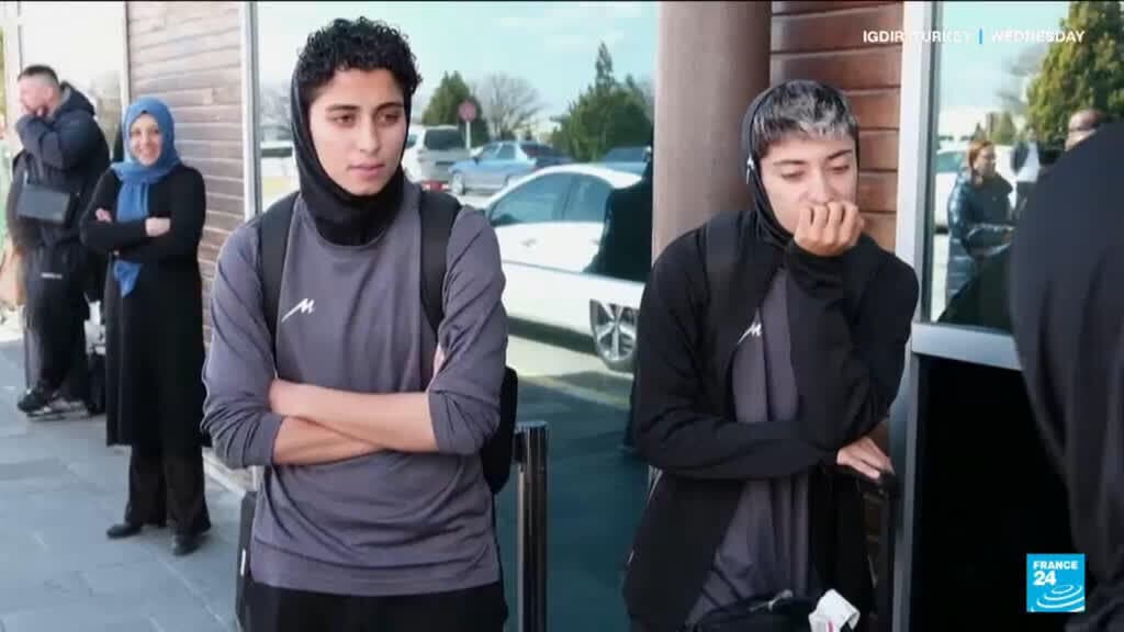 Iran women's football team return after asylum tussle