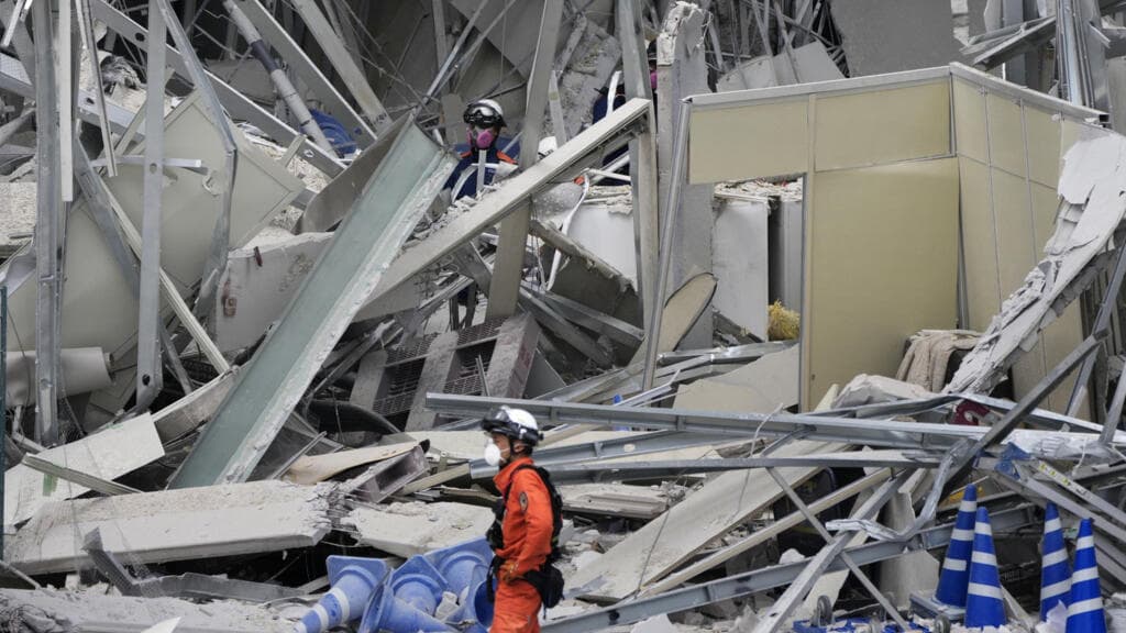 Japan Conducts Search for Earthquake Survivors as Thousands Evacuate