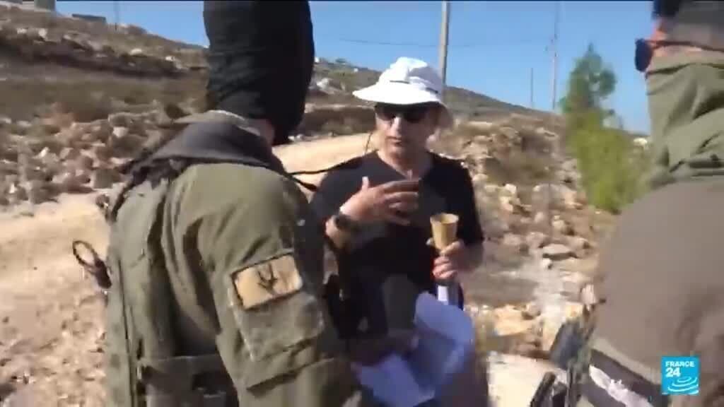 Palestinian American confronts Israeli settlers in West Bank village of Qusra