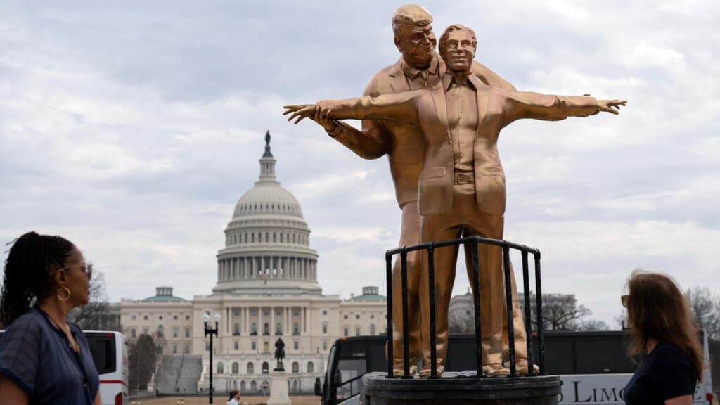 The week in pictures: Trouble in the Strait of Hormuz, Iran’s new leader and a Trump-Epstein statue