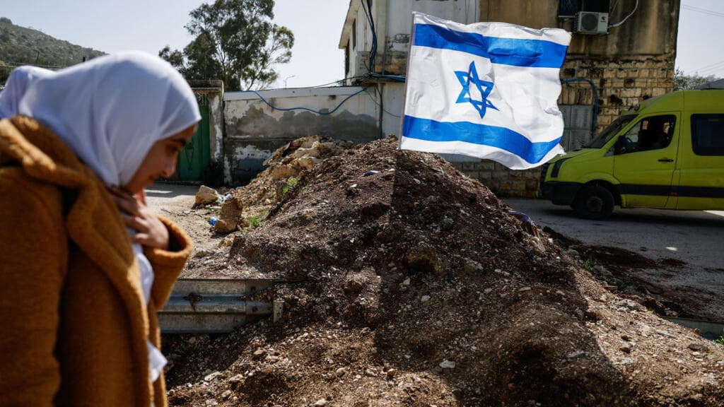 West Bank settler violence surges as Israeli strikes in Gaza kill 4 Palestinians