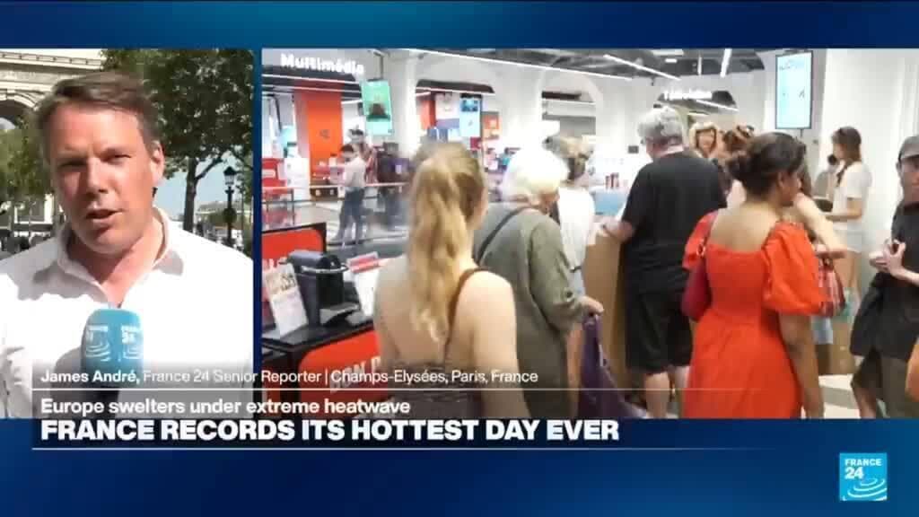 Tourists Seek Shelter from Heatwave on Paris's Champs-Élysées