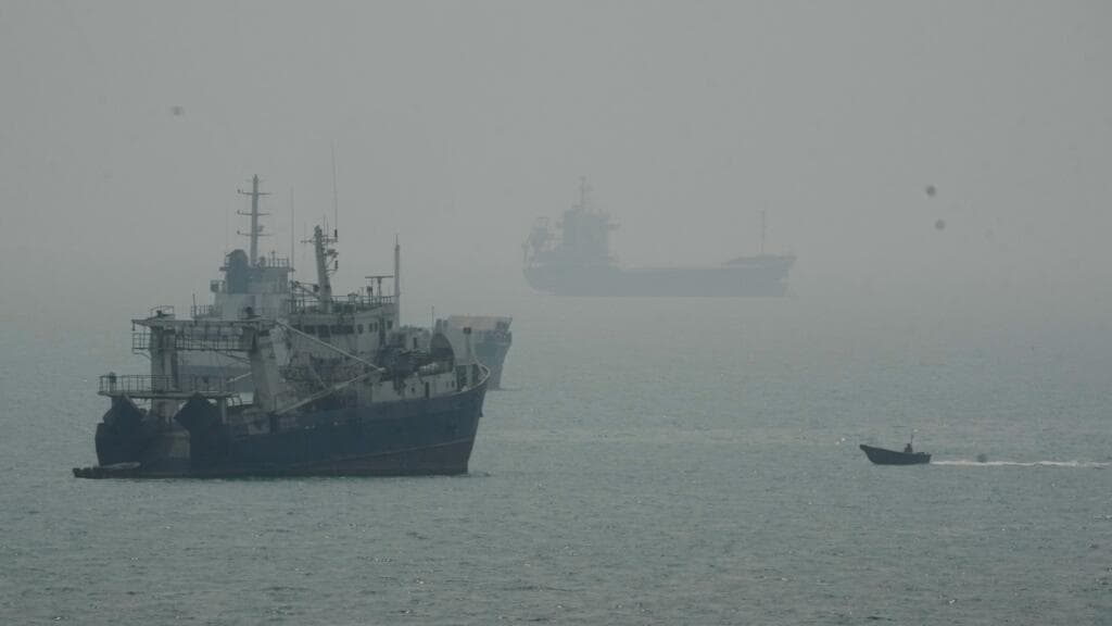 Tanker struck by projectile while entering the Strait of Hormuz, two injured
