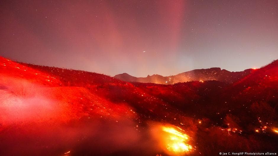 Strong Winds Intensify Fires Near Los Angeles, Prompting Evacuations