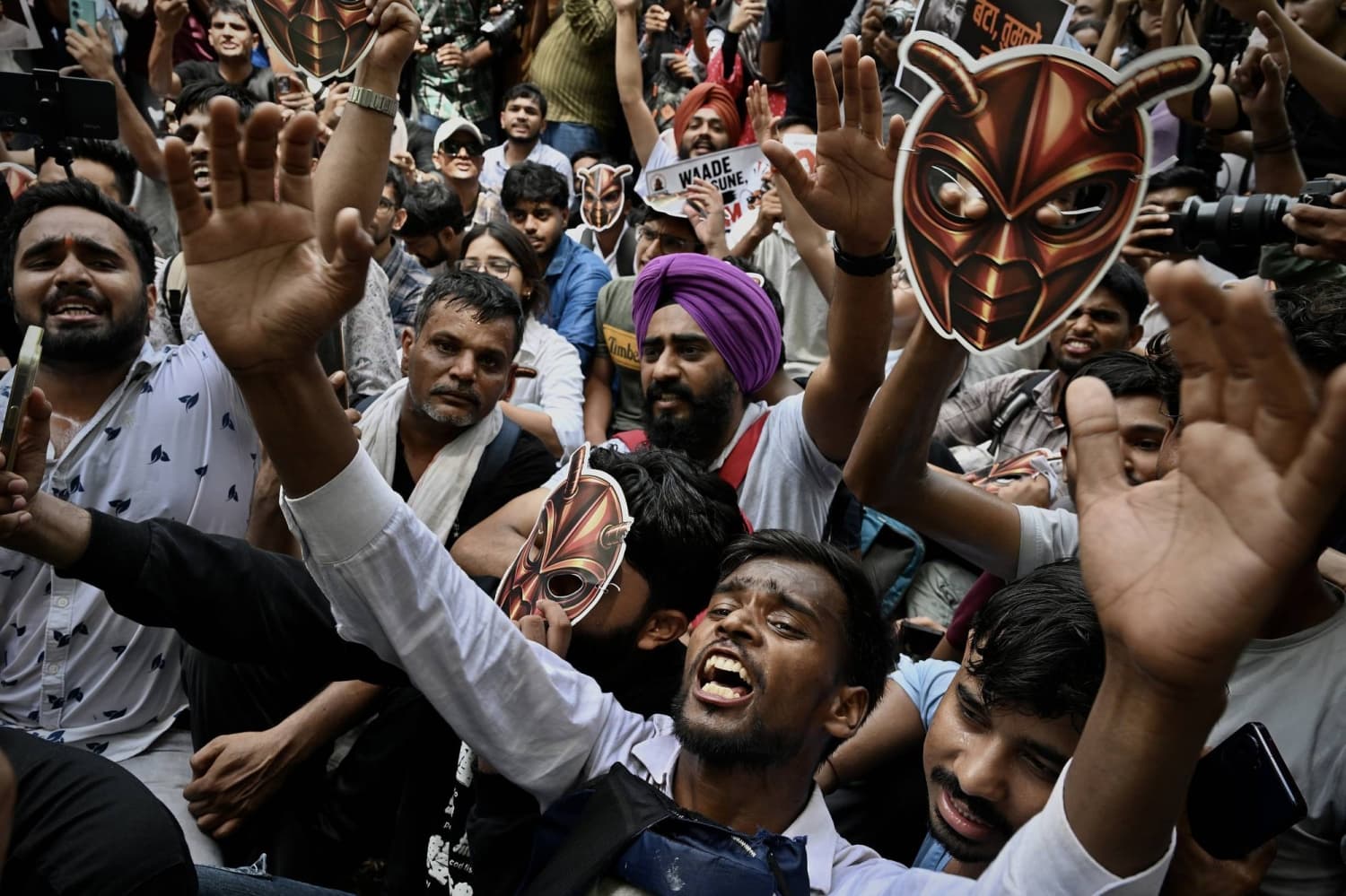 ’Cockroach’ youth group founder leads first street protest after arrival in India