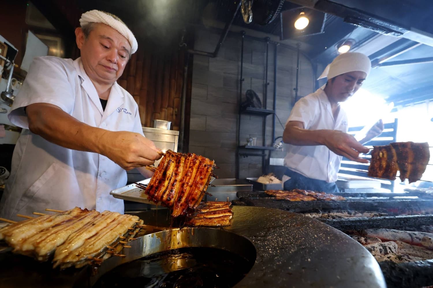 Tokyo Residents Queue for Grilled Eel on Midsummer Day of the Ox Amid Heat
