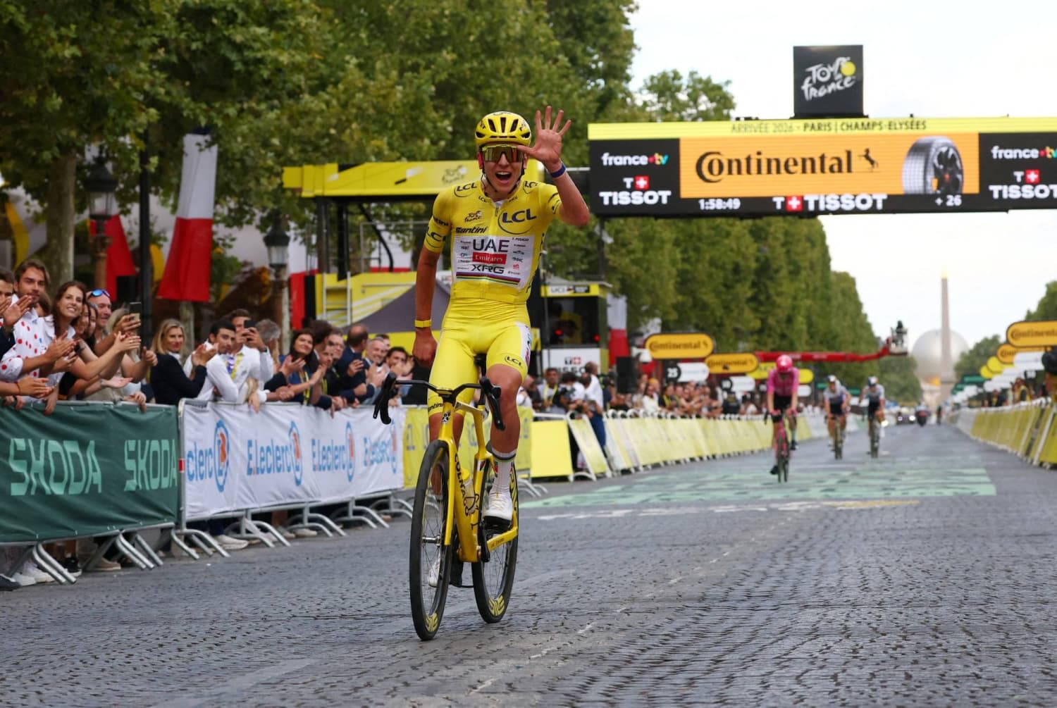 Tadej Pogacar secures fifth Tour de France title, matching historic record