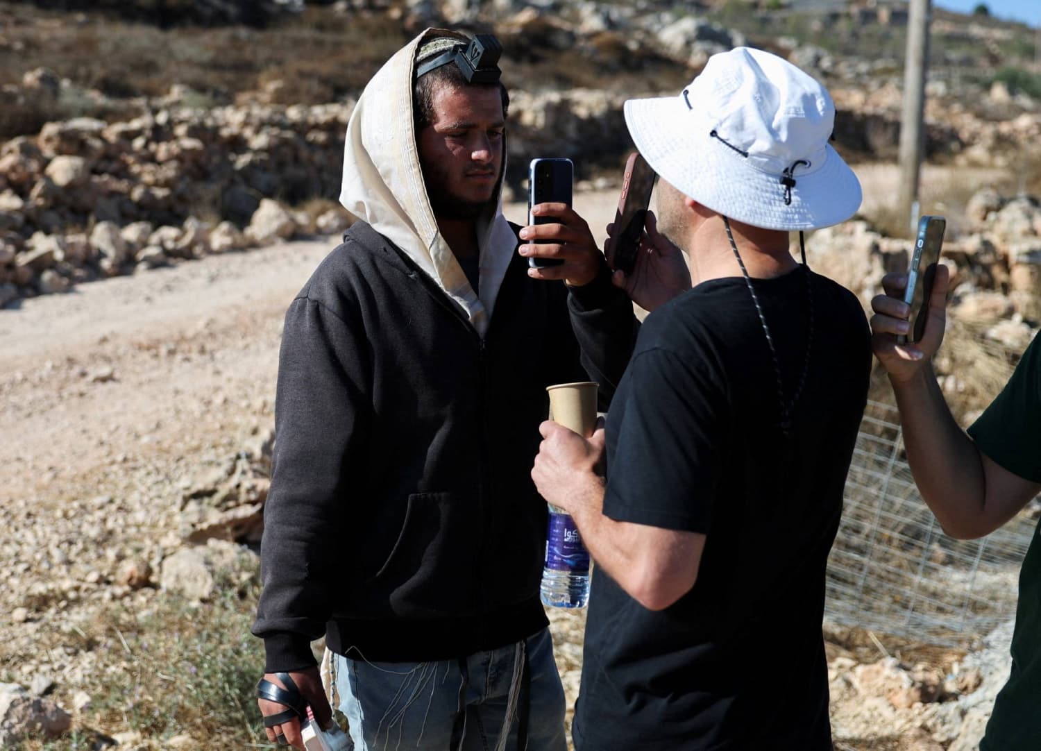 Israeli Settler Encounters Palestinian American at Besieged West Bank Residence