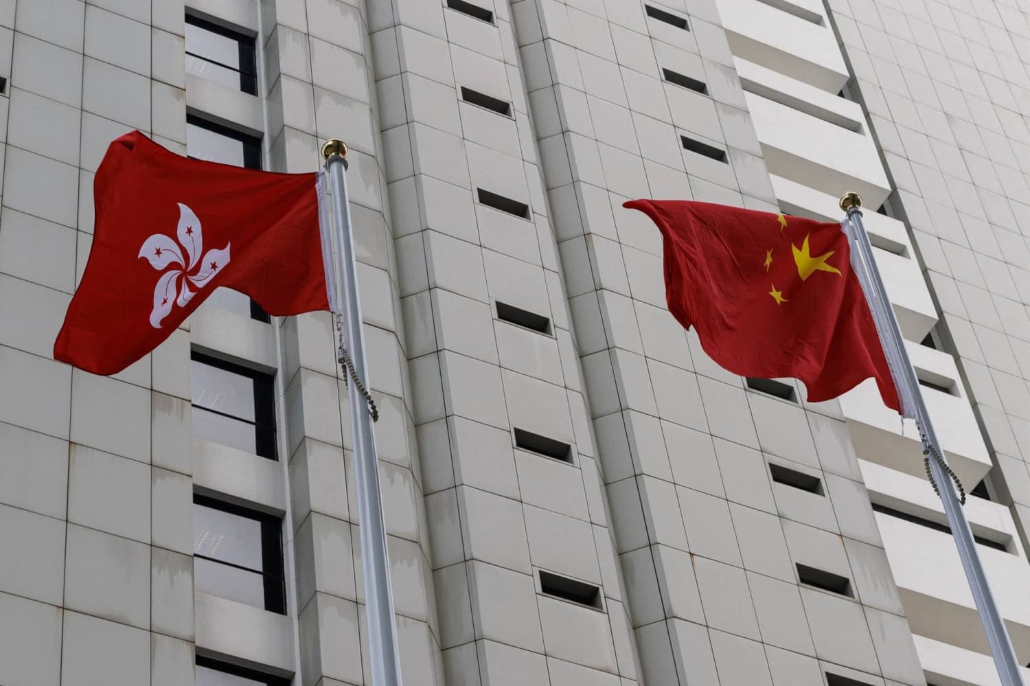 Hong Kong's Low Tax Appeal Faces Challenges Amid Financial Diversification Efforts